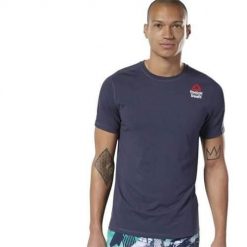 Koszulka sportowa męska Reebok AX8852. Niebieskie koszulki sportowe męskie Reebok, m, bez wzorów, z materiału, bez kołnierzyka, bez ramiączek, na fitness i siłownię. Za 219.00 zł.