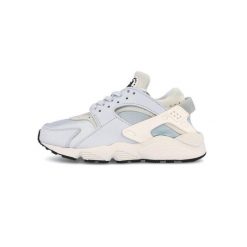 Buty Nike Air Huarache Niebiesko/Białe. Białe obuwie sportowe damskie Nike, bez wzorów, z gumy, trekkingowe. Za 424.15 zł.