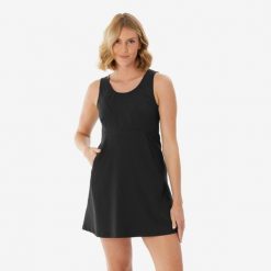 Sukienka turystyczna damska Quechua Exploor. Czarne koszule damskie QUECHUA, xl, bez wzorów, z materiału, sportowe, bez kołnierzyka, bez ramiączek. Za 79.99 zł.