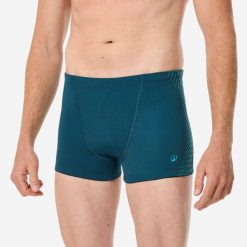 Bokserki pływackie męskie Decathlon Fiti. Niebieskie kąpielówki męskie Decathlon, m, bez wzorów, z materiału, do pływania. Za 69.99 zł.