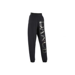 Luźne spodnie modułowe do tańca nowoczesnego damskie. Spodnie materiałowe damskie DOMYOS, l, bez wzorów, z bawełny, na fitness i siłownię. Za 69.99 zł.