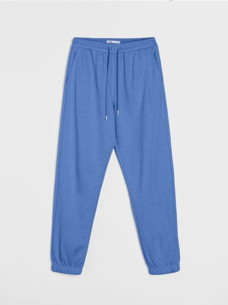 Dresowe spodnie jogger terry - niebieski. Niebieskie spodnie dresowe damskie Sinsay, l, bez wzorów, z dresówki. Za 29.99 zł.