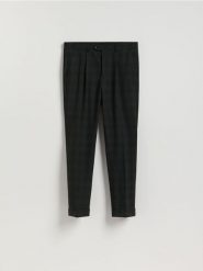 Garniturowe spodnie w kratę - czarny. Czarne eleganckie spodnie męskie Reserved, bez wzorów, z tkaniny. Za 169.99 zł.