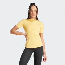 Koszulka damska adidas Techfit. Białe koszulki sportowe damskie Adidas, l, bez wzorów, sportowe, bez kołnierzyka. Za 157.30 zł.