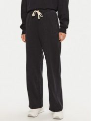 Champion Spodnie dresowe 117638 Czarny Wide Leg. Czarne spodnie dresowe damskie Champion, m, bez wzorów, z bawełny. Za 139.99 zł.