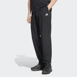Spodnie sportowe męskie ADIDAS. Spodnie sportowe męskie Adidas, m, bez wzorów, z materiału, na fitness i siłownię. Za 179.99 zł.