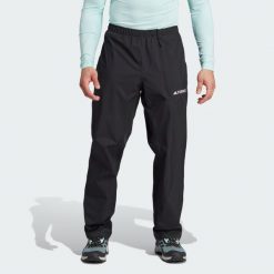 Spodnie Terrex Multi RAIN.RDY 2-Layer Rain. Czarne buty sportowe męskie Adidas, z materiału, bez zapięcia, na fitness i siłownię. W wyprzedaży za 299.40 zł.