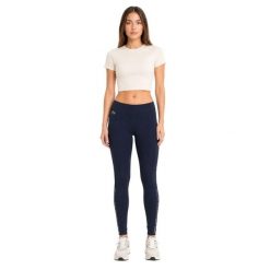 Spodnie damskie Lacoste sportowe treningowe legginsy granatowe. Niebieskie legginsy damskie Lacoste, uniwersalny, bez wzorów, z elastanu, na fitness i siłownię. Za 357.00 zł.