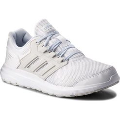 Buty adidas - Galaxy 4 B43832 Ftwwht/Greone/Aerblu. Białe obuwie sportowe damskie Adidas, z materiału. W wyprzedaży za 179.00 zł.