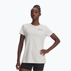 Koszulka Under Armour Project Rock Graphic 2. Białe koszulki sportowe damskie Under Armour, bez wzorów, bez kołnierzyka, bez ramiączek, na fitness i siłownię. Za 139.99 zł.