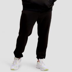 Spodnie męskie fitness regular Unity. Czarne spodnie sportowe męskie GYMBEAM, m, bez wzorów, z bawełny, na fitness i siłownię. Za 118.90 zł.