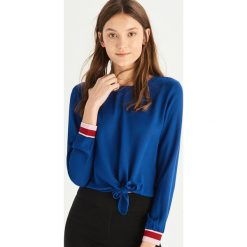 Bluzka z wiązaniem - Niebieski. Bluzki damskie marki Sinsay. Za 39.99 zł.