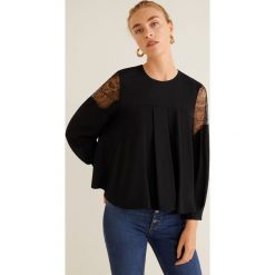 Mango - Bluzka Xoco. Czarne bluzki damskie Mango, z dzianiny, eleganckie, z okrągłym kołnierzem. Za 139.90 zł.