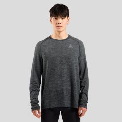 Koszulka z długim rękawem do biegania męska Odlo ESSENTIAL SEAMLESS. Szare koszulki sportowe męskie Odlo, na lato, m, bez wzorów, z materiału, bez kołnierzyka, bez ramiączek, do biegania. Za 221.11 zł.