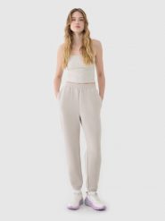 4F Spodnie dresowe joggery z modalem damskie - beżowe XL. Brązowe spodnie dresowe damskie 4f, l, bez wzorów, z dresówki. W wyprzedaży za 139.99 zł.