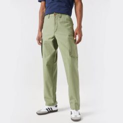 MESKIE SPODNIE WRANGLER CASEY JONES CARGO OLIVE 112350906. Zielone spodnie materiałowe męskie Wrangler, l, bez wzorów. Za 219.99 zł.