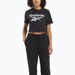 Koszulka Reebok Identity Big Logo Crop Tee. Czarne koszulki sportowe damskie REEBOK FITNESS, bez wzorów, sportowe, bez kołnierzyka. Za 69.99 zł.