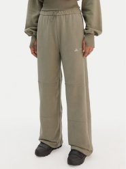 Adidas Spodnie dresowe JM1099 Zielony Regular Fit. Zielone spodnie dresowe damskie Adidas, xl, bez wzorów, z bawełny. Za 299.99 zł.