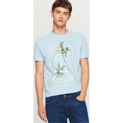 T-shirt z nadrukiem - Niebieski. Niebieskie t-shirty damskie Reserved, l, bez wzorów, bez kołnierzyka. Za 49.99 zł.