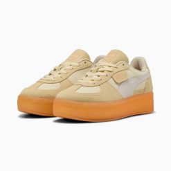 Buty sportowe damskie Puma PALERMO ELEVATA XTRA 40128502. Brązowe obuwie sportowe damskie Puma, bez wzorów, z nubiku. Za 341.78 zł.