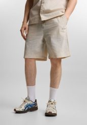Spodenki sportowe męskie Prosto Club. Brązowe krótkie spodenki sportowe męskie Prosto., l, z aplikacjami, z nylonu. Za 219.99 zł.