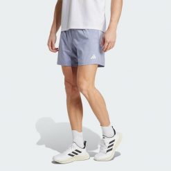 Szorty Own The Run. Szare krótkie spodenki sportowe męskie Adidas, bez wzorów, z materiału, do biegania. Za 179.00 zł.