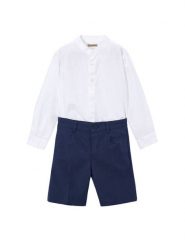 Mayoral Komplet koszula i szorty materiałowe 3216 Granatowy Regular Fit. Niebieskie koszule dla chłopców Mayoral, bez wzorów, z bawełny, bez kołnierzyka, bez ramiączek. Za 199.99 zł.