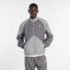 Kurtka męska New Balance MJ61J73YCAS – szara. Szare kurtki męskie New Balance, m, bez wzorów, z materiału, sportowe, bez kaptura. Za 499.99 zł.