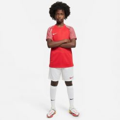 Spodnie piłkarskie chłopięce Nike Park Iii JR. Białe spodnie materiałowe dla chłopców Nike, bez wzorów, z materiału. Za 69.99 zł.