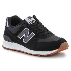 Buty do chodzenia damskie New Balance Sneakersy. Czarne obuwie sportowe damskie New Balance, bez wzorów, z materiału, trekkingowe. Za 439.00 zł.