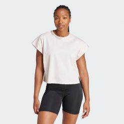 Koszulka Studio. Fioletowe koszulki sportowe damskie Adidas, xs, bez wzorów, z materiału, bez kołnierzyka, bez ramiączek, na fitness i siłownię. W wyprzedaży za 142.00 zł.