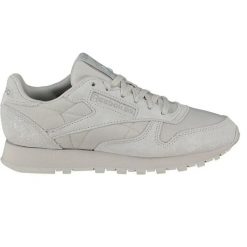 Buty treningowe damskie Reebok Classic Leather. Szare obuwie sportowe damskie Reebok, bez wzorów, z gumy, trekkingowe, Reebok Classic. Za 269.49 zł.