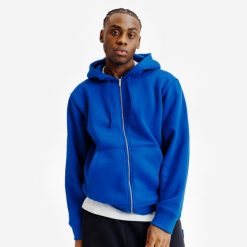 Bluza na suwak unisex Elementals. Niebieskie bluzy męskie Decathlon, m, bez wzorów, z bawełny, z kapturem. W wyprzedaży za 119.99 zł.