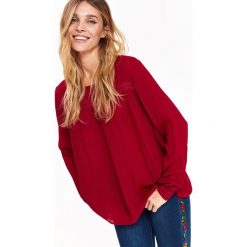 BLUZKA O LUŹNYM KROJU Z FALBANĄ. T-shirty i topy dla dziewczynek marki TOP SECRET. W wyprzedaży za 39.99 zł.