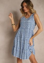 Niebieska Sukienka z Bawełnianej Tkaniny w Nakrapiany Wzór Bez Rękawów Nativoria. Niebieskie sukienki damskie Renee, na co dzień, na lato, l, bez wzorów, z bawełny, eleganckie, bez kołnierzyka, bez ramiączek, midi, kopertowe. Za 39.99 zł.