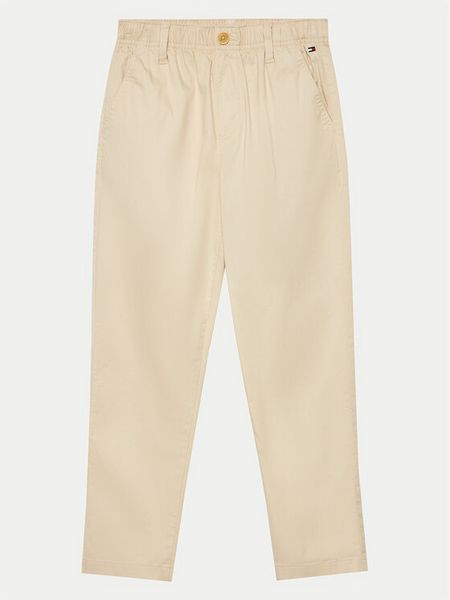 Tommy Hilfiger Spodnie materiałowe Monotype KB0KB09146 Beżowy Regular Fit. Brązowe spodnie materiałowe dla chłopców Tommy Hilfiger, bez wzorów, z bawełny. Za 179.99 zł.