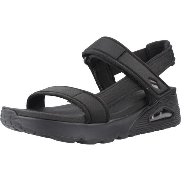 Sandały SKECHERS UNO SANDAL SUMMER STAND 2 Czarny. Czarne sandały damskie Skechers, bez wzorów, z materiału, bez obcasa, bez zapięcia. Za 255.99 zł.
