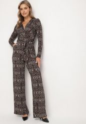 Brązowy Wzorzysty Kombinezon z Wiskozą o Kopertowym Kroju Mesicea. Brązowe sukienki damskie Born2be, na co dzień, l, z aplikacjami, z wiskozy, eleganckie, bez kołnierzyka, bez ramiączek, kopertowe. Za 79.99 zł.