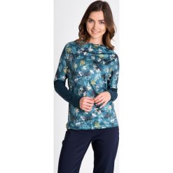 Zielona bluzka we florystyczny print QUIOSQUE. Bluzki damskie marki QUIOSQUE. W wyprzedaży za 49.99 zł.
