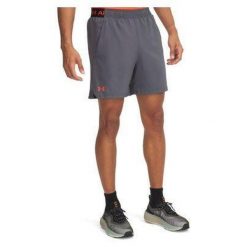 Spodenki męskie Under Armour Vanish Woven 6in Shorts. Szare buty sportowe męskie Under Armour, bez zapięcia, na fitness i siłownię. Za 191.40 zł.