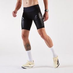Legginsy do biegania w terenie krótkie męskie Kiprun Trail Run 900 Ultra. Czarne legginsy sportowe męskie KIPRUN, l, bez wzorów, z elastanu, krótkie, do biegania. Za 219.99 zł.
