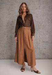 Brązowa Rozkloszowana Spódnica z Wiskozy Zdobiona Rozcięciem i Paskiem Urilia. Brązowe spódnice damskie Renee, l, z aplikacjami, z koronki, eleganckie, maxi, rozkloszowane. Za 119.99 zł.