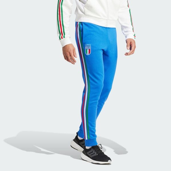 Spodnie dresowe Italy DNA. Niebieskie spodnie sportowe męskie Adidas, xl, bez wzorów, z bawełny, do piłki nożnej. Za 276.50 zł.