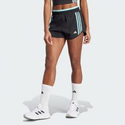 Szorty Own the Run 3-Stripes. Czarne szorty sportowe damskie Adidas, bez wzorów, z materiału, sportowe, do biegania. W wyprzedaży za 190.05 zł.