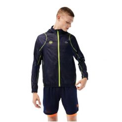 Kurtka turystyczna męska Lacoste Sport Roland Garros. Niebieskie kurtki sportowe męskie Lacoste, na lato, m, z aplikacjami, z materiału, na fitness i siłownię. Za 567.00 zł.