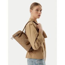 Torebka Calvin Klein. Brązowe torebki do ręki damskie Calvin Klein, bez wzorów, klasyczne, bez dodatków. Za 649.99 zł.