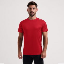Funkcjonalna koszulka męska Rogelli PROMOTION. Czerwone koszulki sportowe męskie Rogelli, m, bez wzorów, bez kołnierzyka, bez ramiączek, na fitness i siłownię. W wyprzedaży za 40.00 zł.