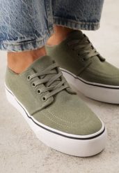 Zielone Klasyczne Tenisówki z Ozdobnym Paskiem przy Podeszwie Ranora. Zielone obuwie sportowe damskie Born2be, bez wzorów, z dresówki, klasyczne, bez zapięcia. Za 49.99 zł.