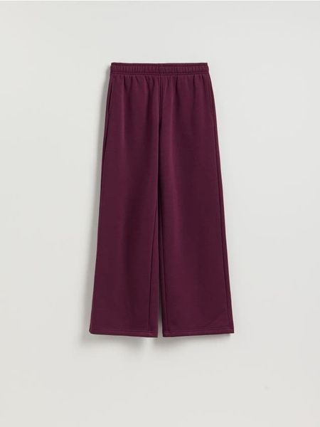 Spodnie dresowe - ciemnofioletowy. Fioletowe spodnie dresowe damskie Reserved, l, bez wzorów, z bawełny. Za 99.99 zł.