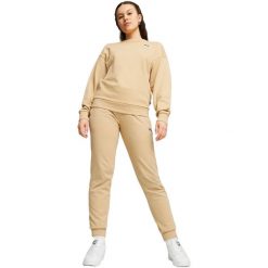 Spodnie Puma Better Essentials Cl FL, Kobiety. Brązowe obuwie sportowe damskie Puma, bez wzorów, z bawełny, na fitness i siłownię. Za 290.00 zł.